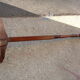 Coat rack known as "Parrot" in mahogany and bronze, circa 1950