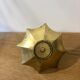 Brass pocket emptier
