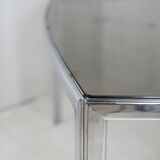 Living table. chrome metal, curved smoked glass slab, france, circa 1970.