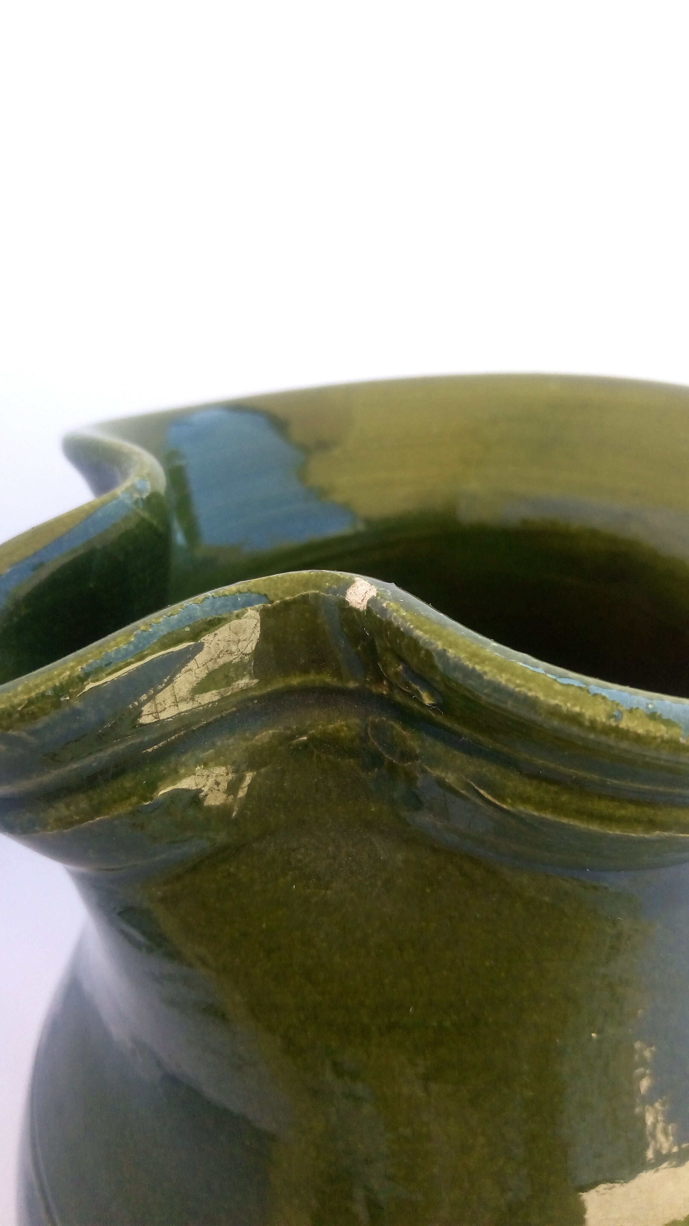 Green ceramic pitcher