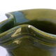 Green ceramic pitcher