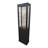 Old two-door shop showcase with black patina