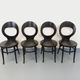 Set of 4 vintage Mouette chairs by Baumann in black wood from the 1960s.