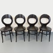 Set of 4 vintage Mouette chairs by Baumann in black wood from the 1960s.