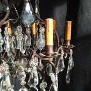 Old chandelier with tassels, bronze and crystal, 8 lights. Louis XV style.
