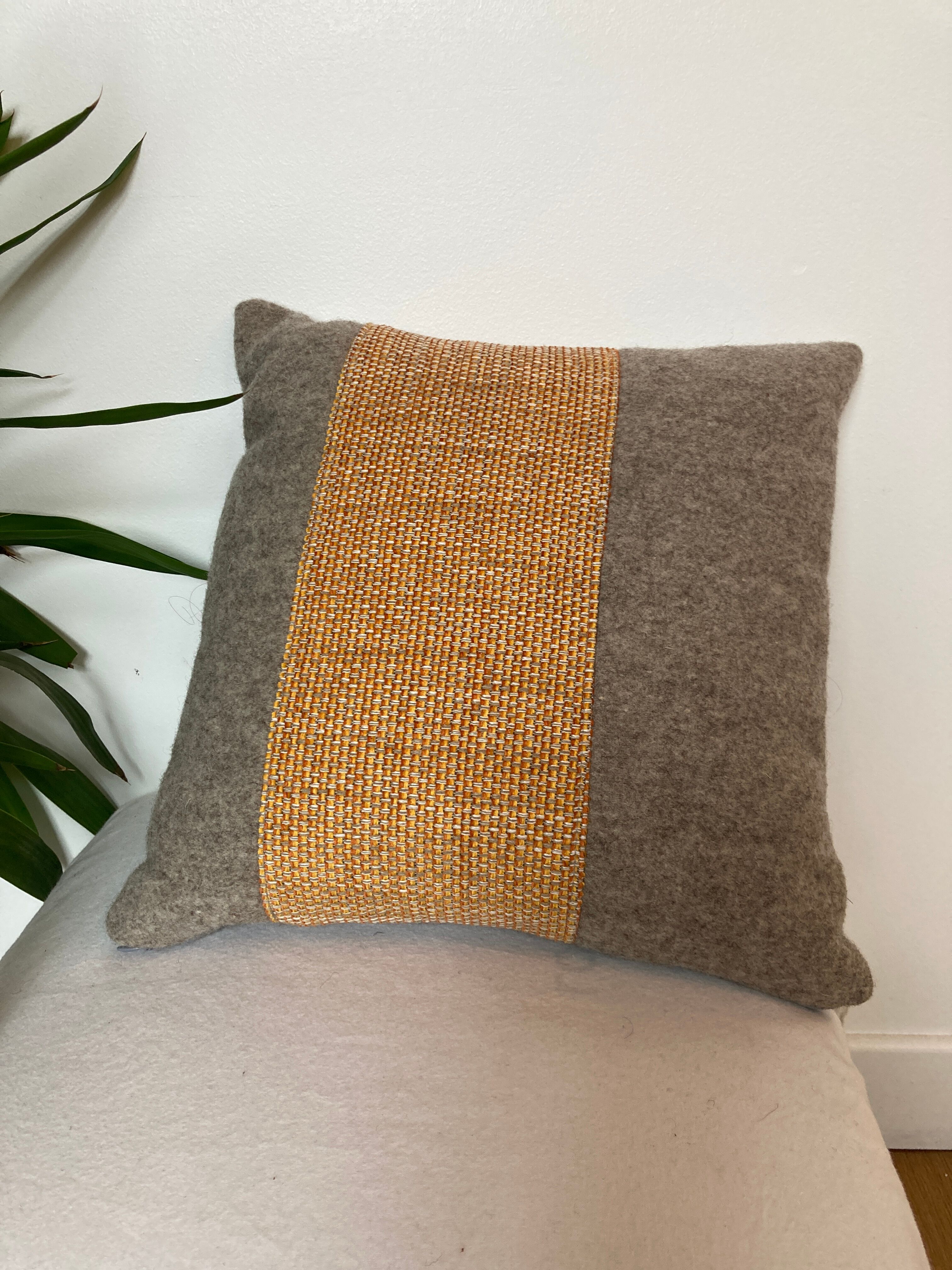 Bi-sided cushion gray wool yoke orange fabric