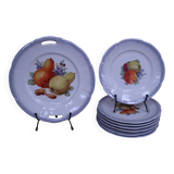 Set of 7 dessert plates and a cake stand with fruit patterns.