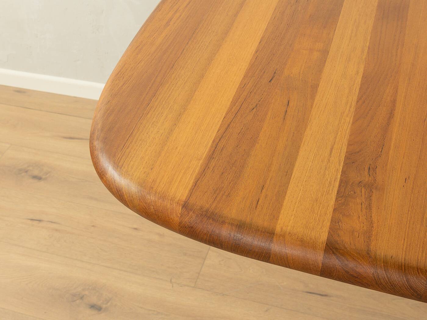 Glostrup dining table, 1980s, solid teak, by Johs. Kristoffersen & Søn, with two extension leaves