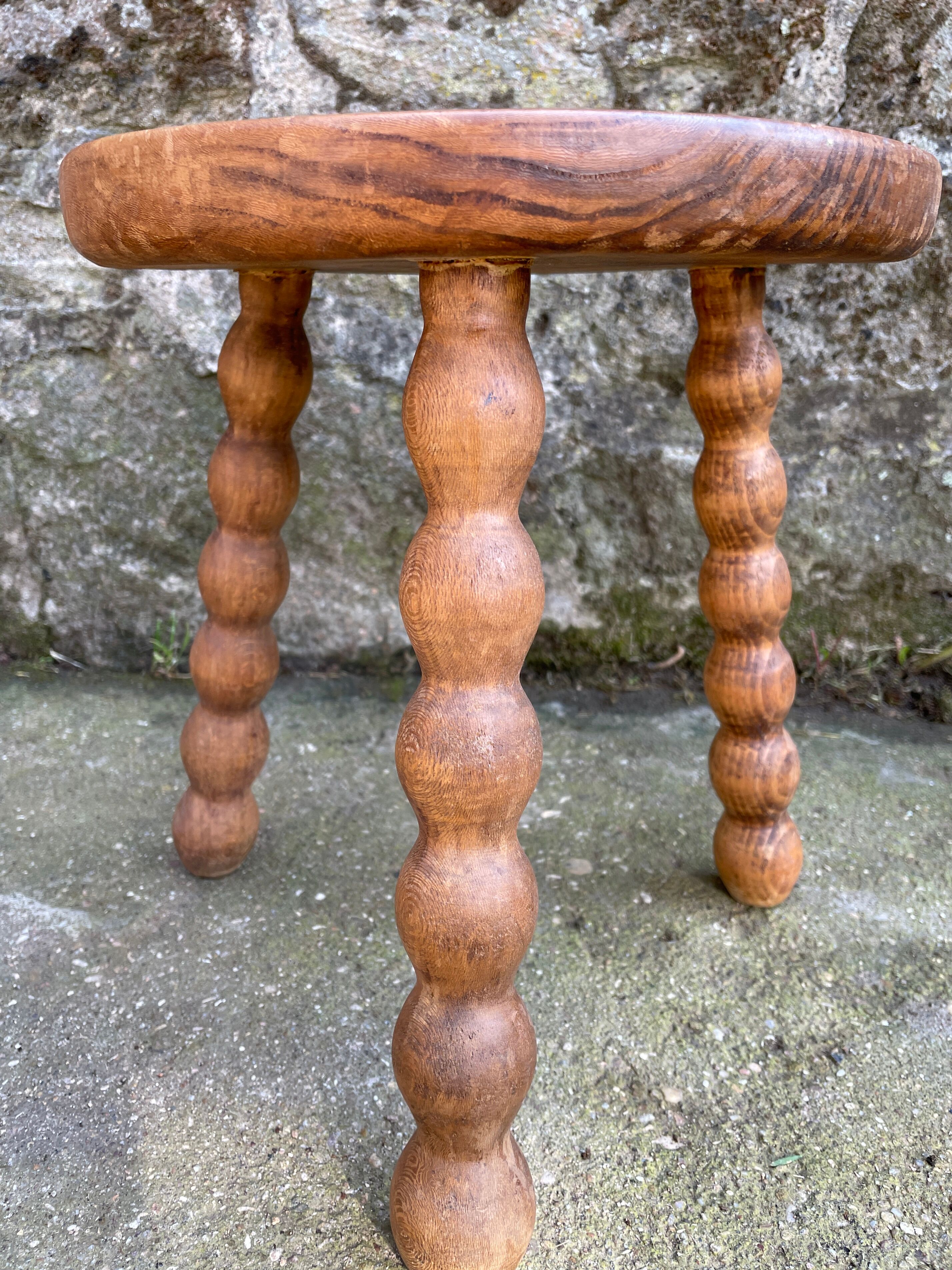 Set of two tripod Breton stools