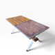 Vintage chrome coffee table with ceramic accent.