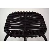 Rattan armchair and matching footstool