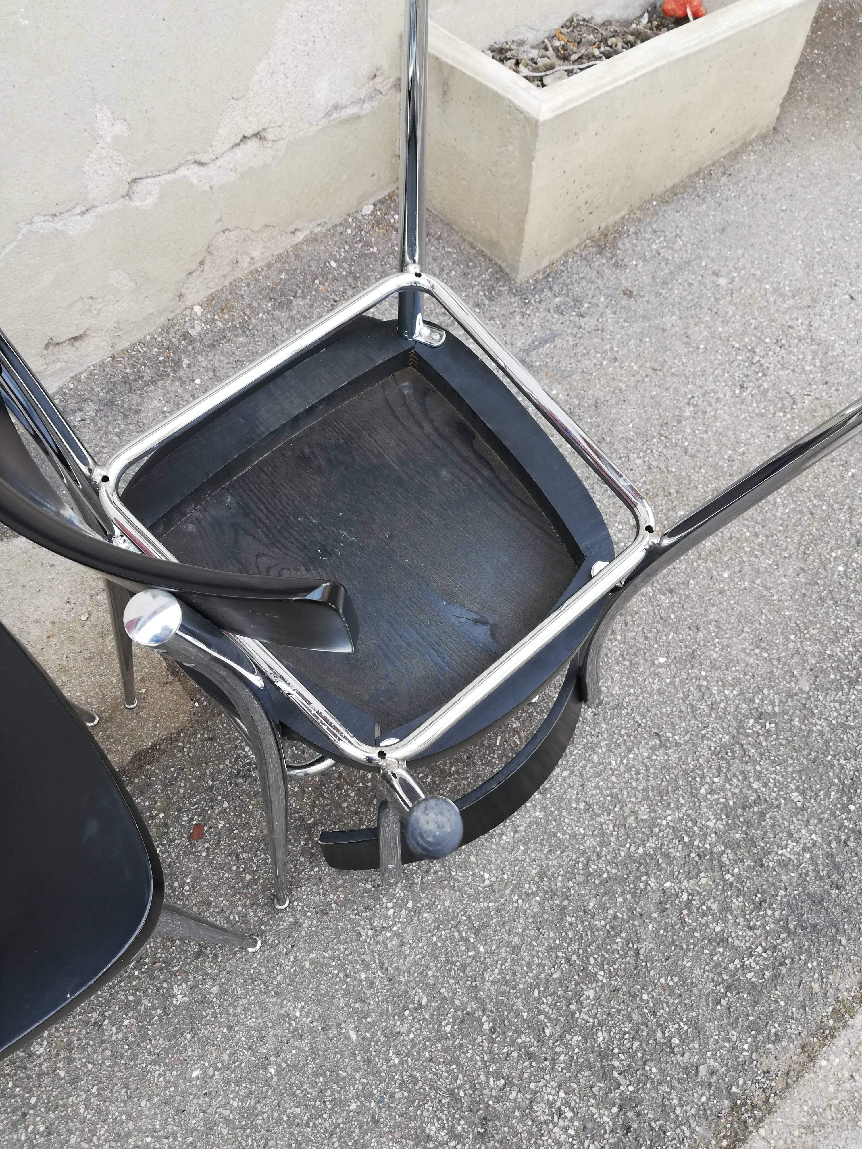 Set of 4 vintage chairs chrome and black wood