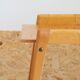 Bedside or side table with compass legs.
