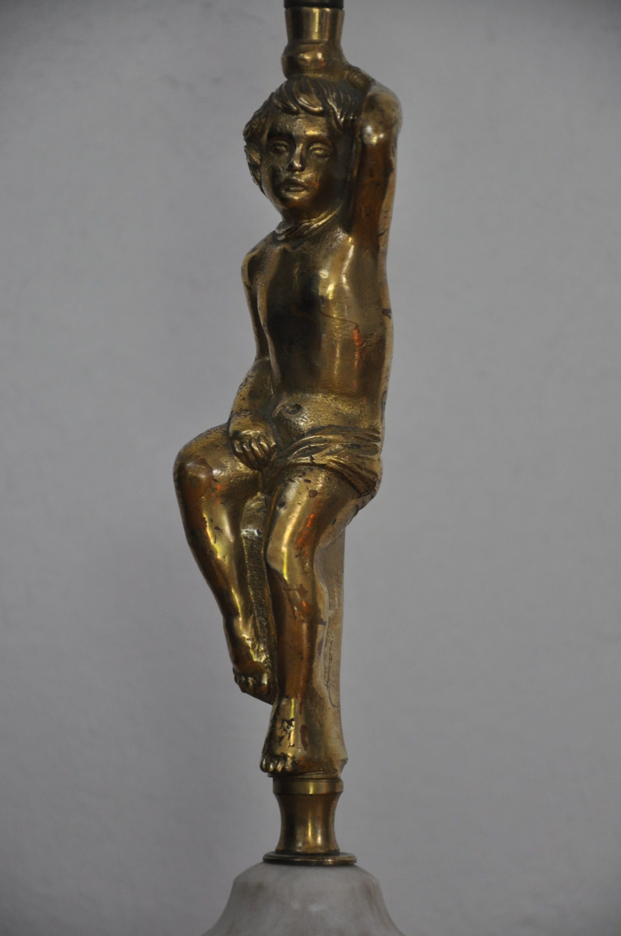 Ancient alabaster lamp and bronze cherub decoration