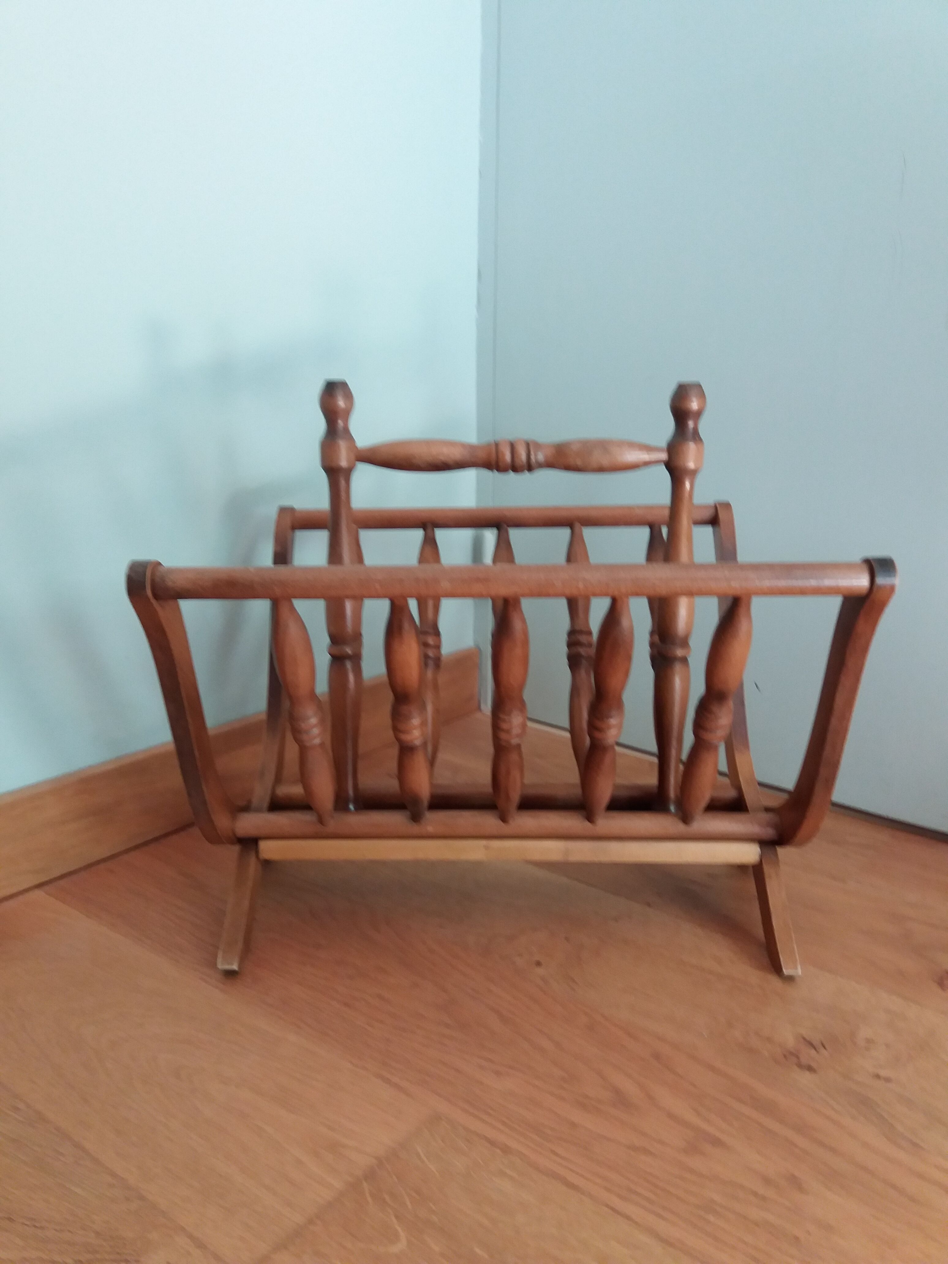 Turned wooden magazine holder