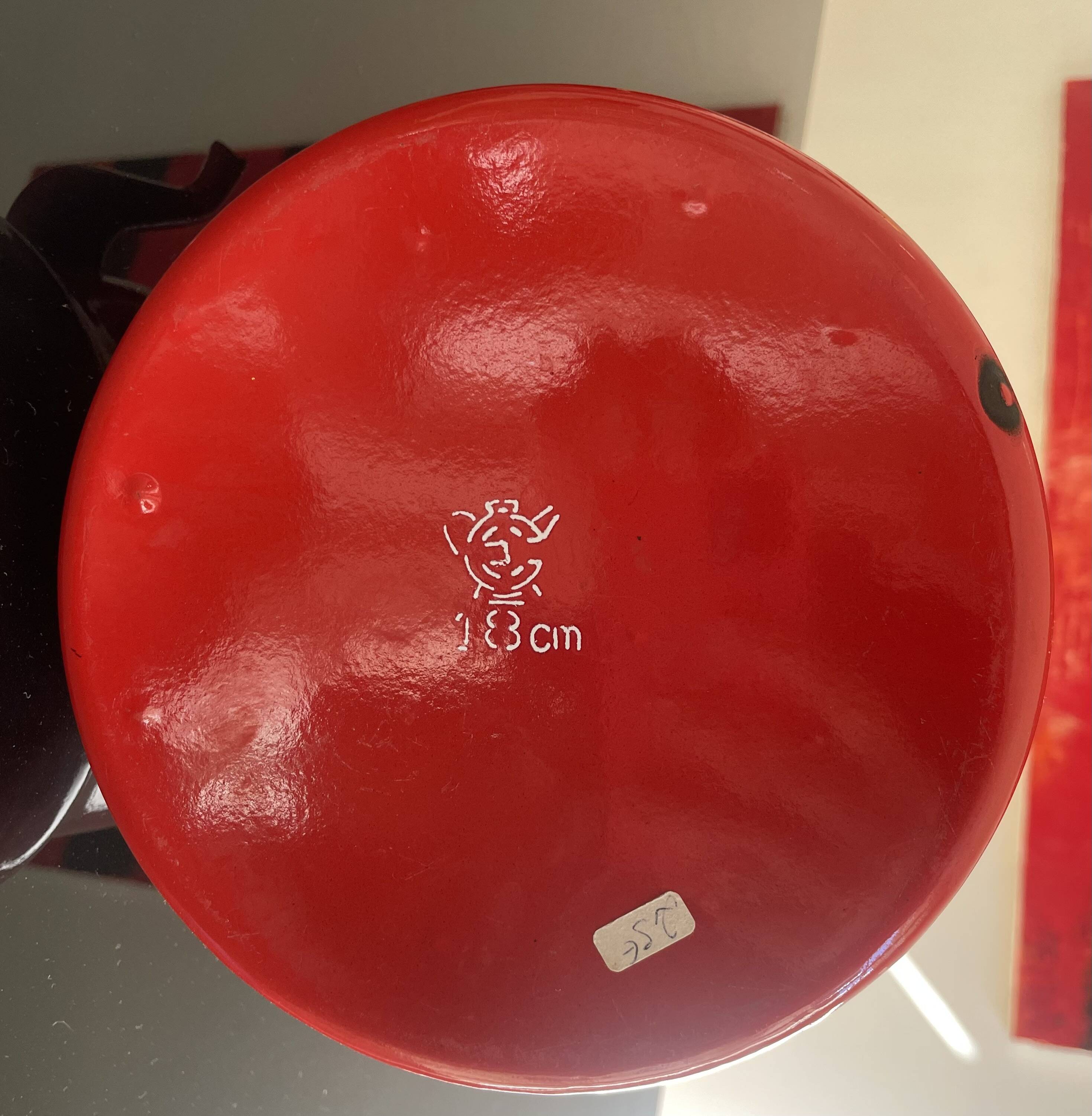 Red enamelled sheet metal kettle