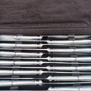 Set of 12 sfam knives in silver metal and stainless steel blades.