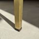 Swedish brass coffee table with a marbled glass top from the 1960s.
