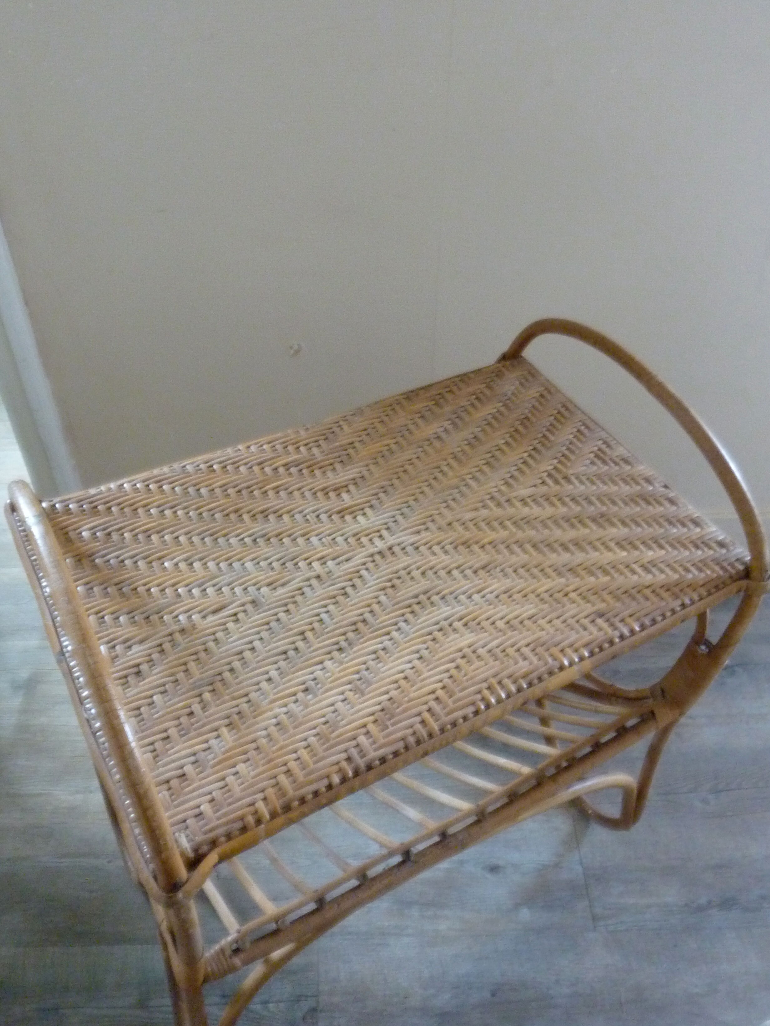 Rattan side table with range records or journals