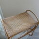 Rattan side table with range records or journals
