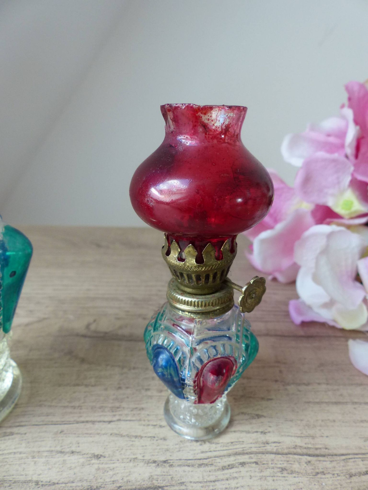 Set of two old coloured glass oil lamps Hong Kong.