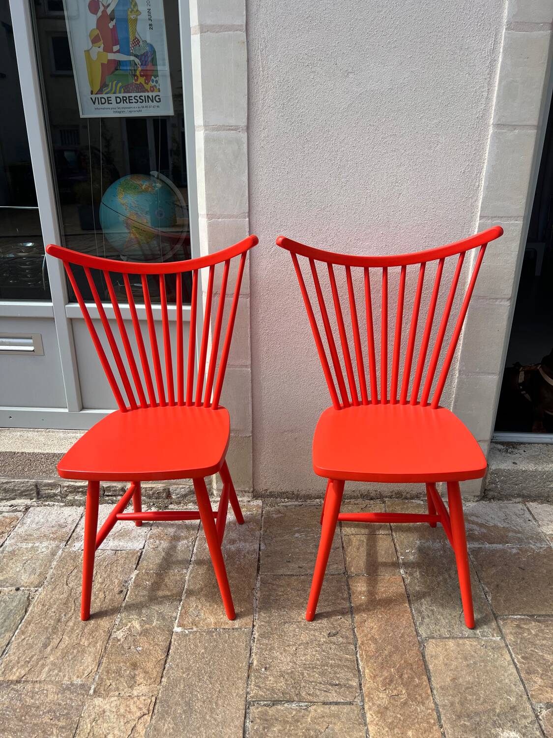 Pair of vintage red Scandinavian chairs from IKEA.