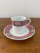 White porcelain flowered cup and saucer