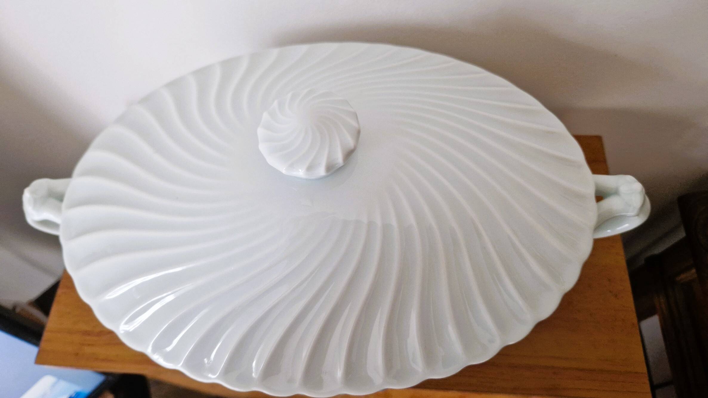 Oval white porcelain soup tureen by Haviland, torso model.