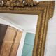 Miroir doré antique fronton coquille, 130x80 cm