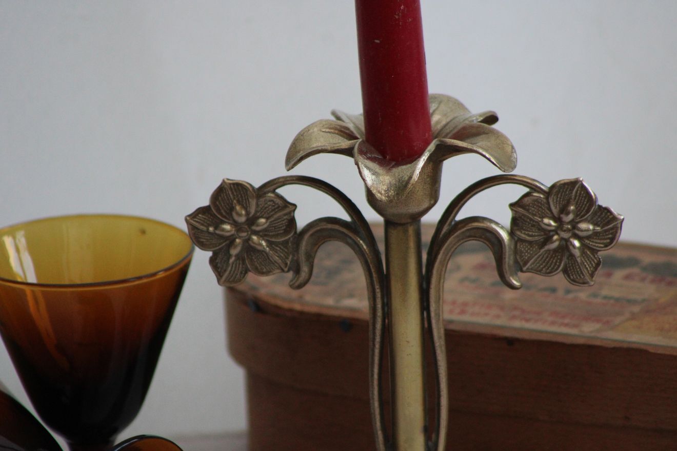 Golden metal stand candle holder