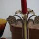Golden metal stand candle holder