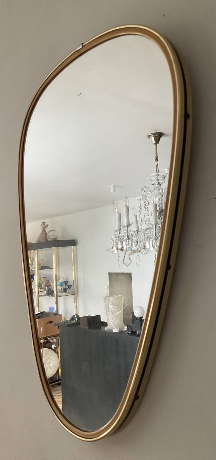 Asymmetrical free-form mirror from the 60s and 70s