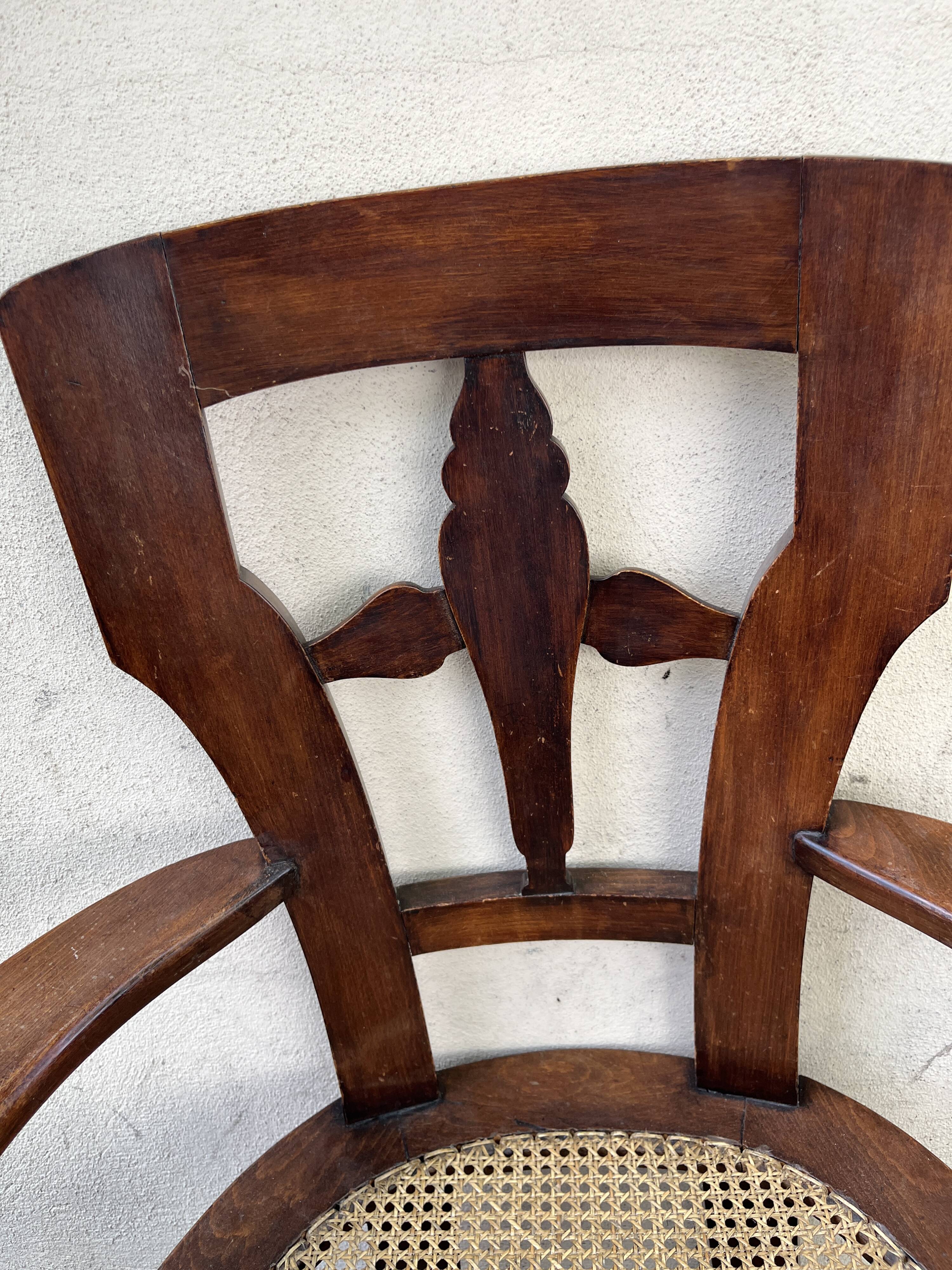 Large caned armchair