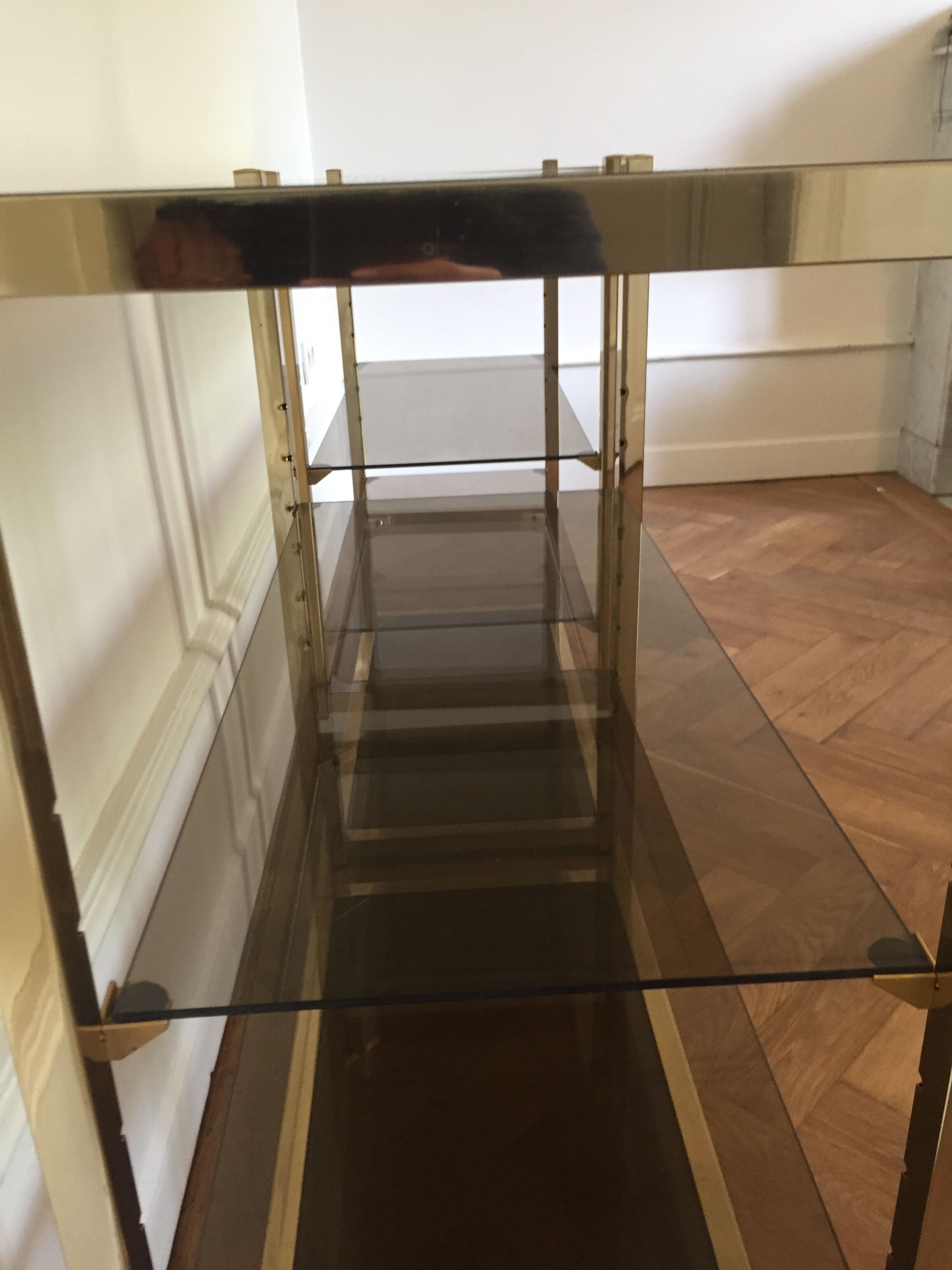 Pair of consoles brass shelves and smoked glass design Roche Bobois