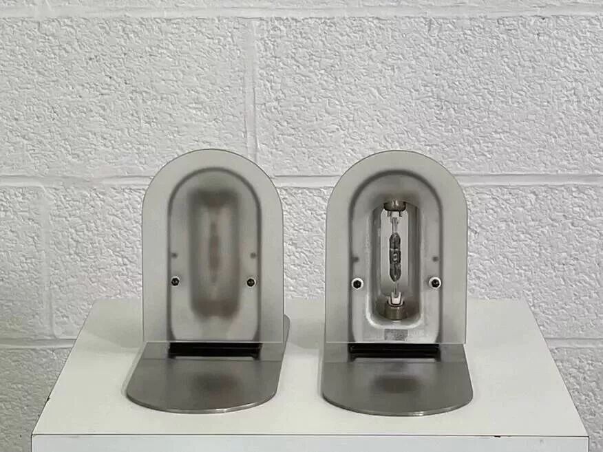 Pair of vintage stainless steel and glass wall lights