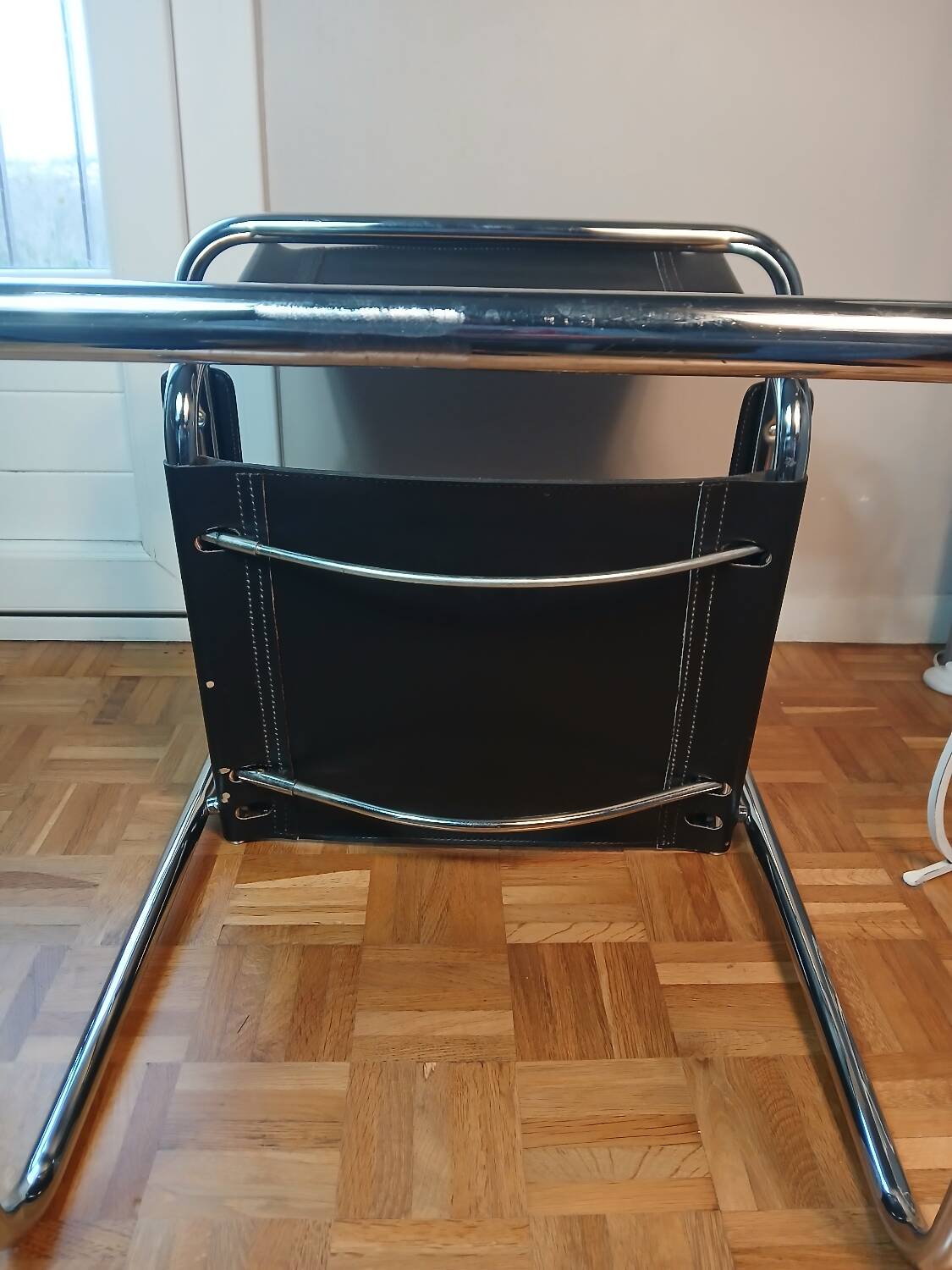 Black leather cantilever chair with chrome steel – Modernist design