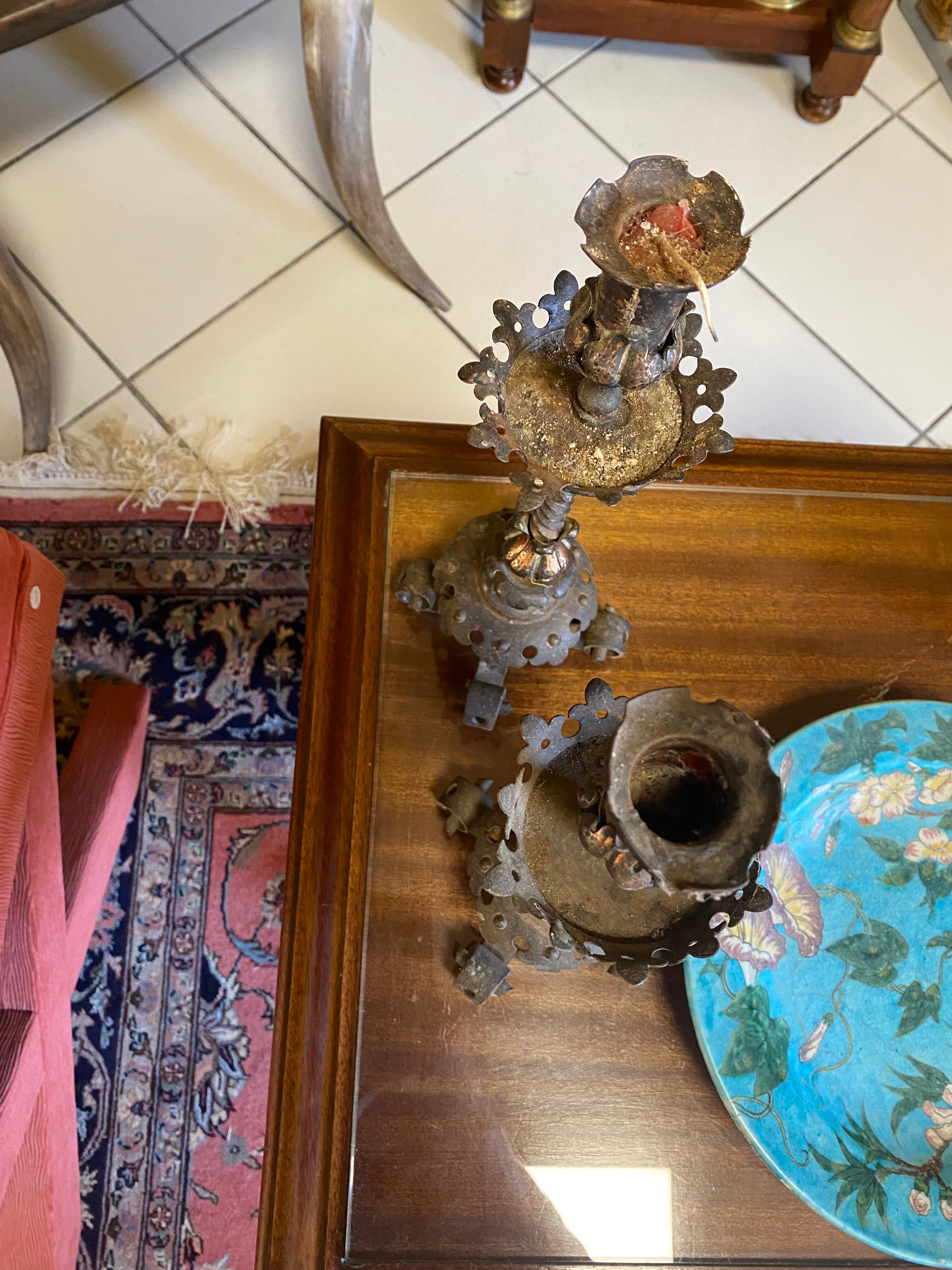 Pair of neo-gothic metal candle holders