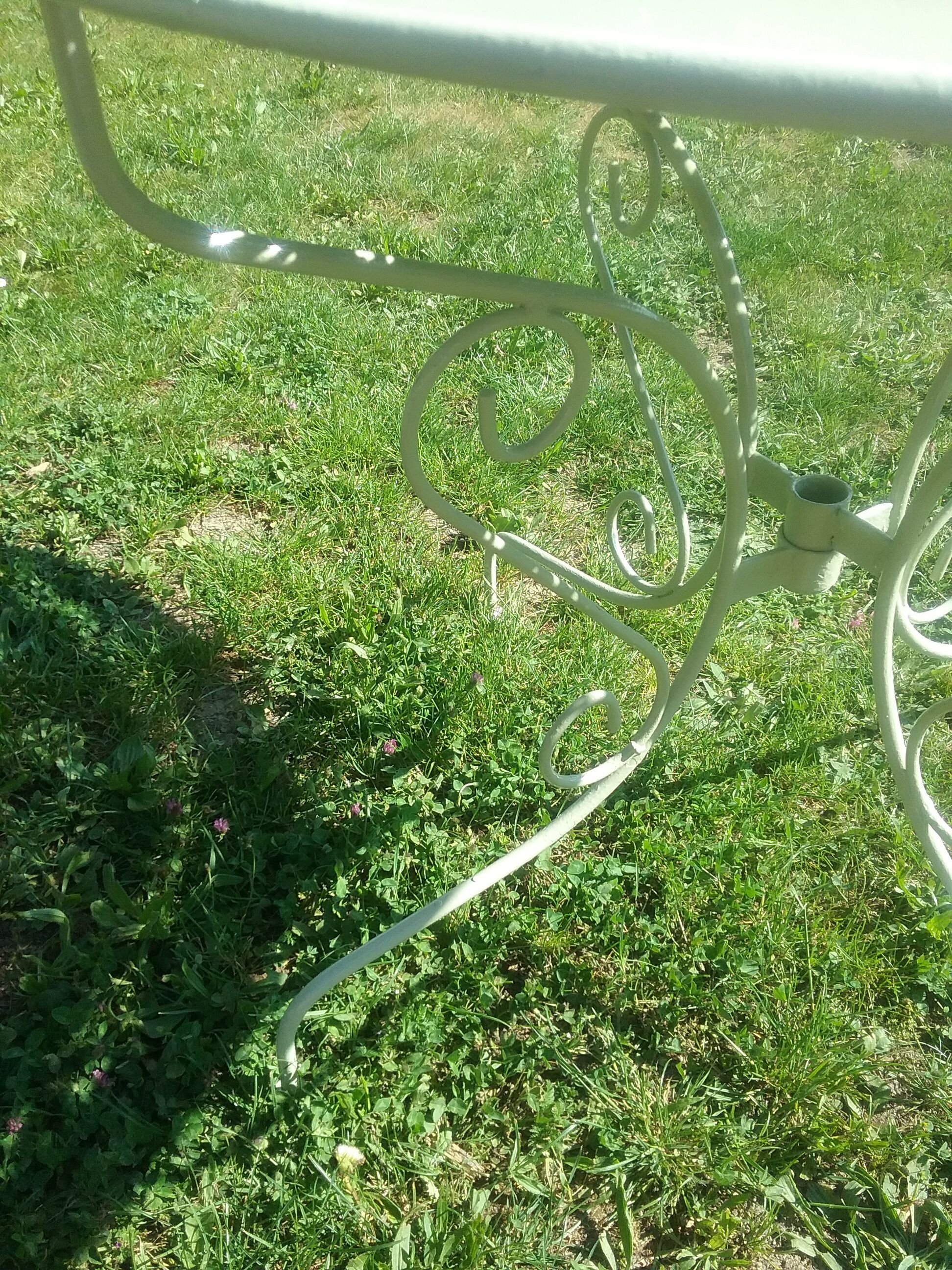 Green wrought iron garden furniture