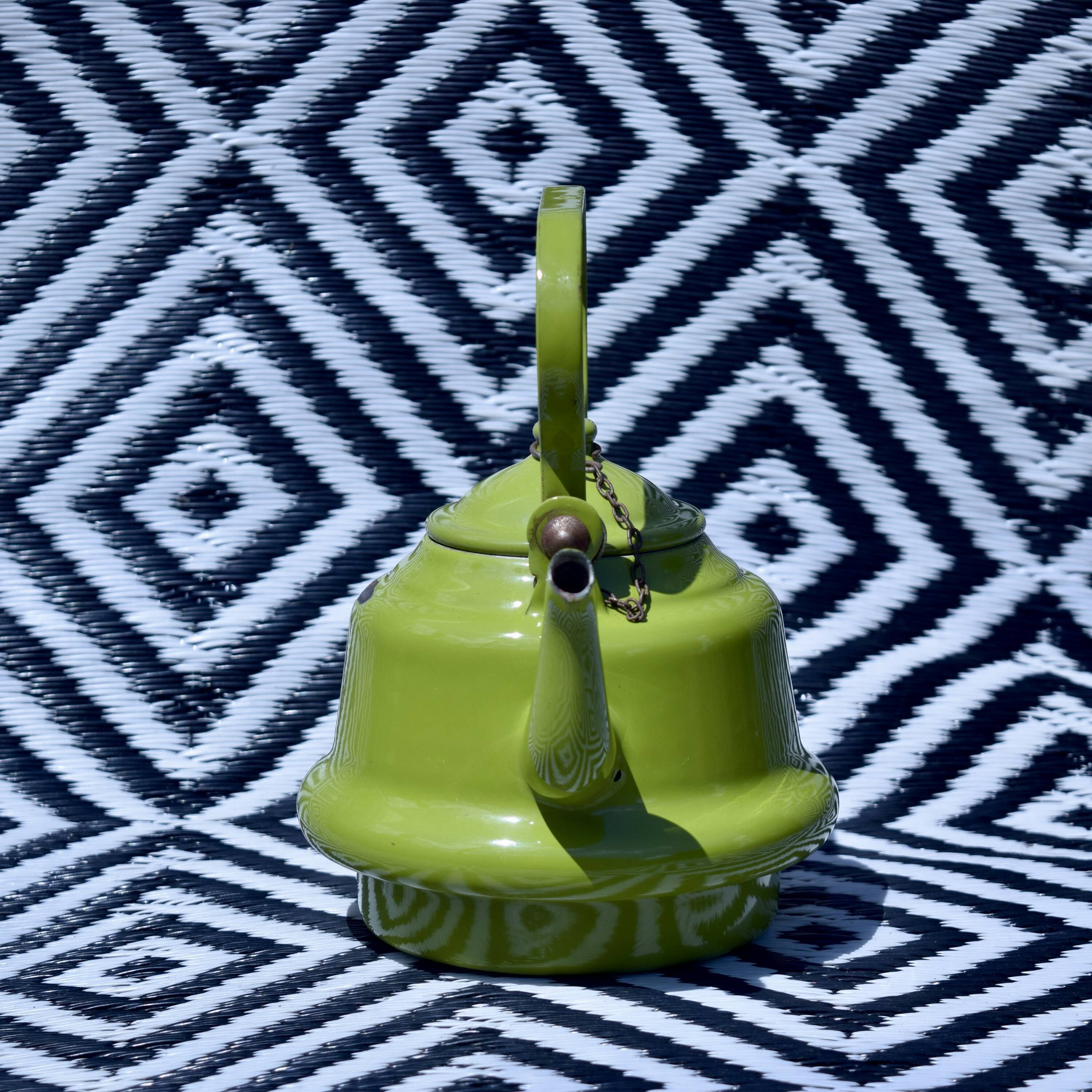 Vintage green enameled sheet metal kettle