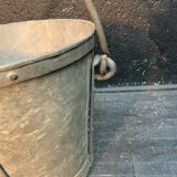 Ancient metal garden bucket