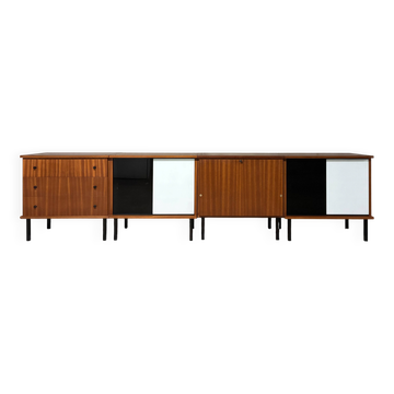 Enfilade buffet display cabinet in vintage 1950s style.