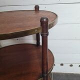 Oval mahogany side table has 3 floors