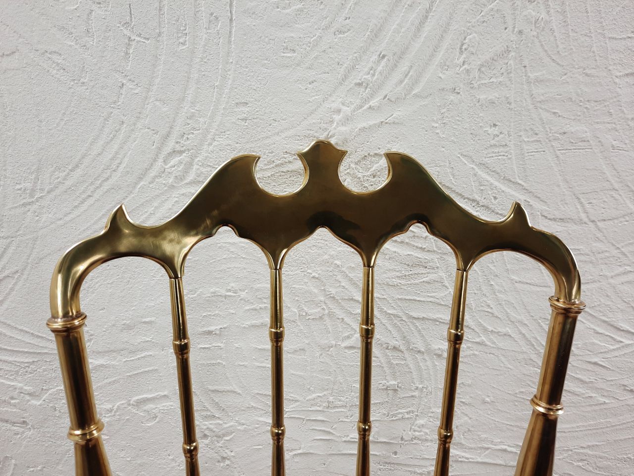 Pair of chiavarine chairs, brass