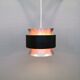 Hanging lamp,  of silver coloured aluminium with black "ring" and orange inner contrast lacquer.