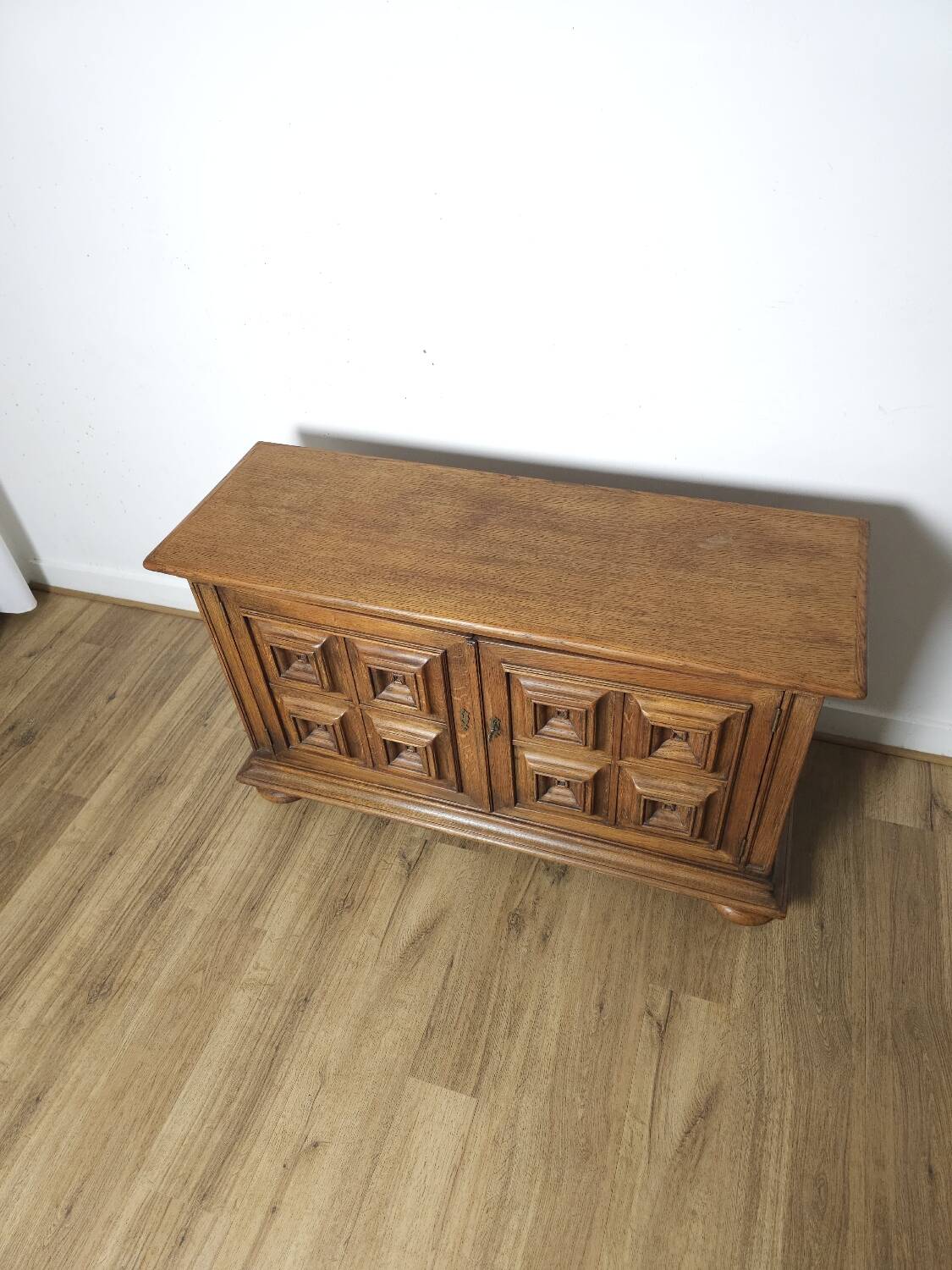 Small two-door oak sideboard, geometric design, mid-century.