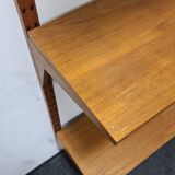 Vintage teak wall system by Poul Cadovious