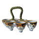 Antique egg holder by Jules Verlingue with polychrome floral decoration.