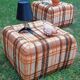 Pair of vintage 70s fabric coffee tables with glass tops