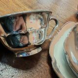 Breakfast set with tea or coffee in porcelain.