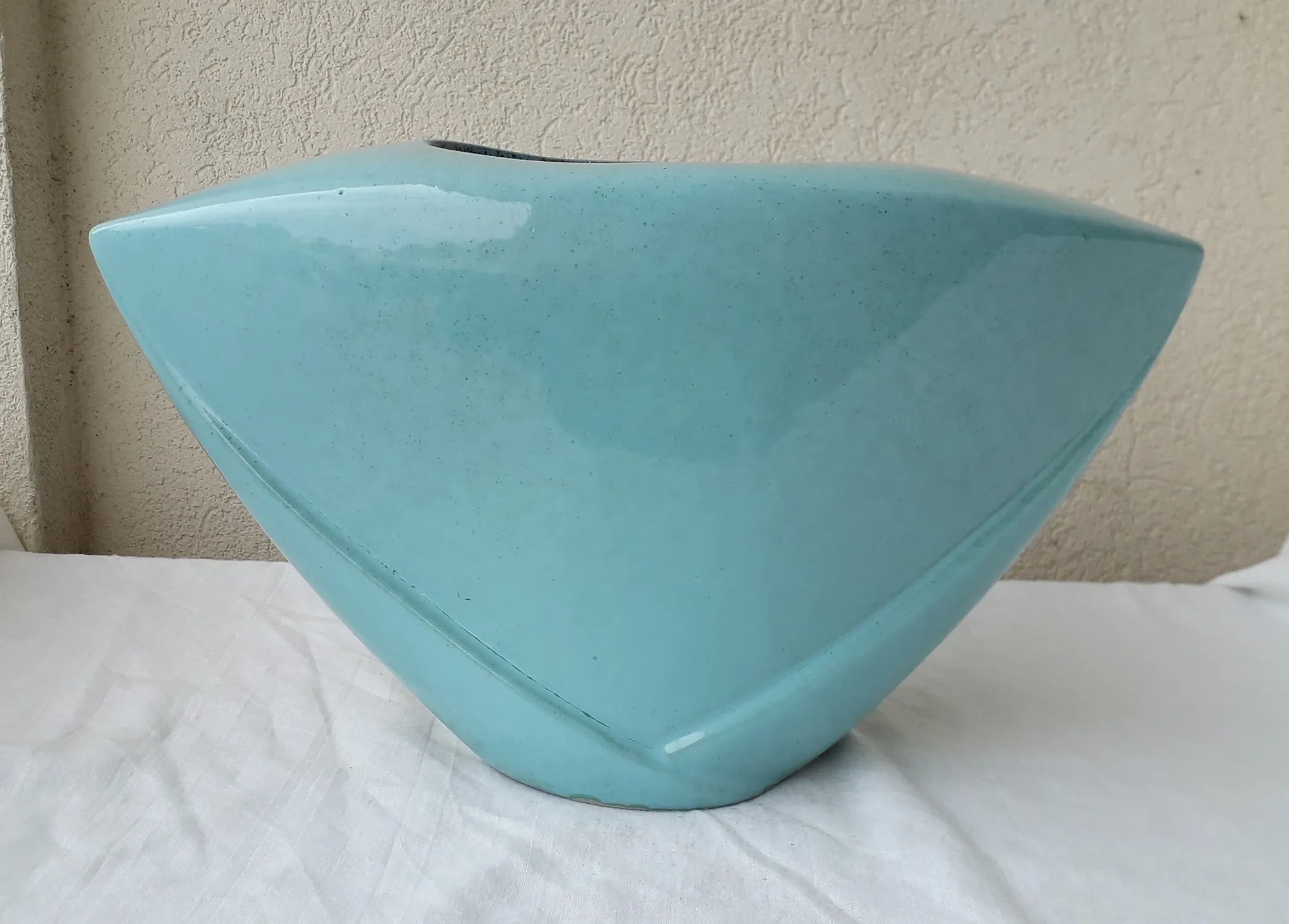 Turquoise ceramic vase